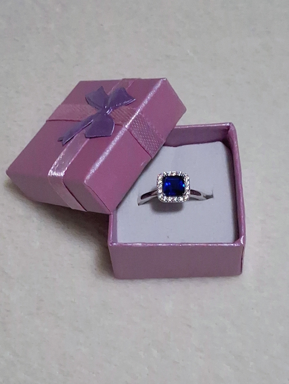 Solid 925SS Blue Sapphire Ring surrounded in AAA Cz's Sz 8